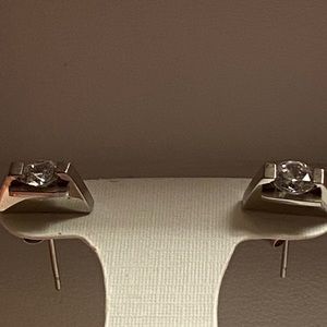 Approximately 5 grams of 316L CZ earrings.